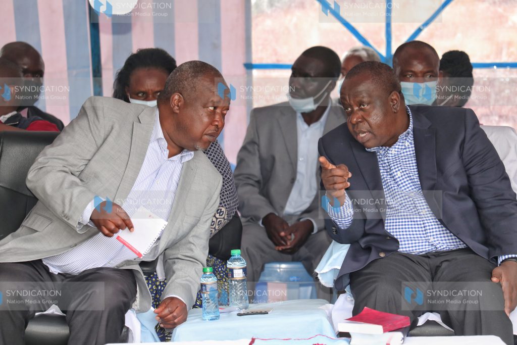 Fred Matiang’i (right) and Nyamira Governor Amos Nyaribo