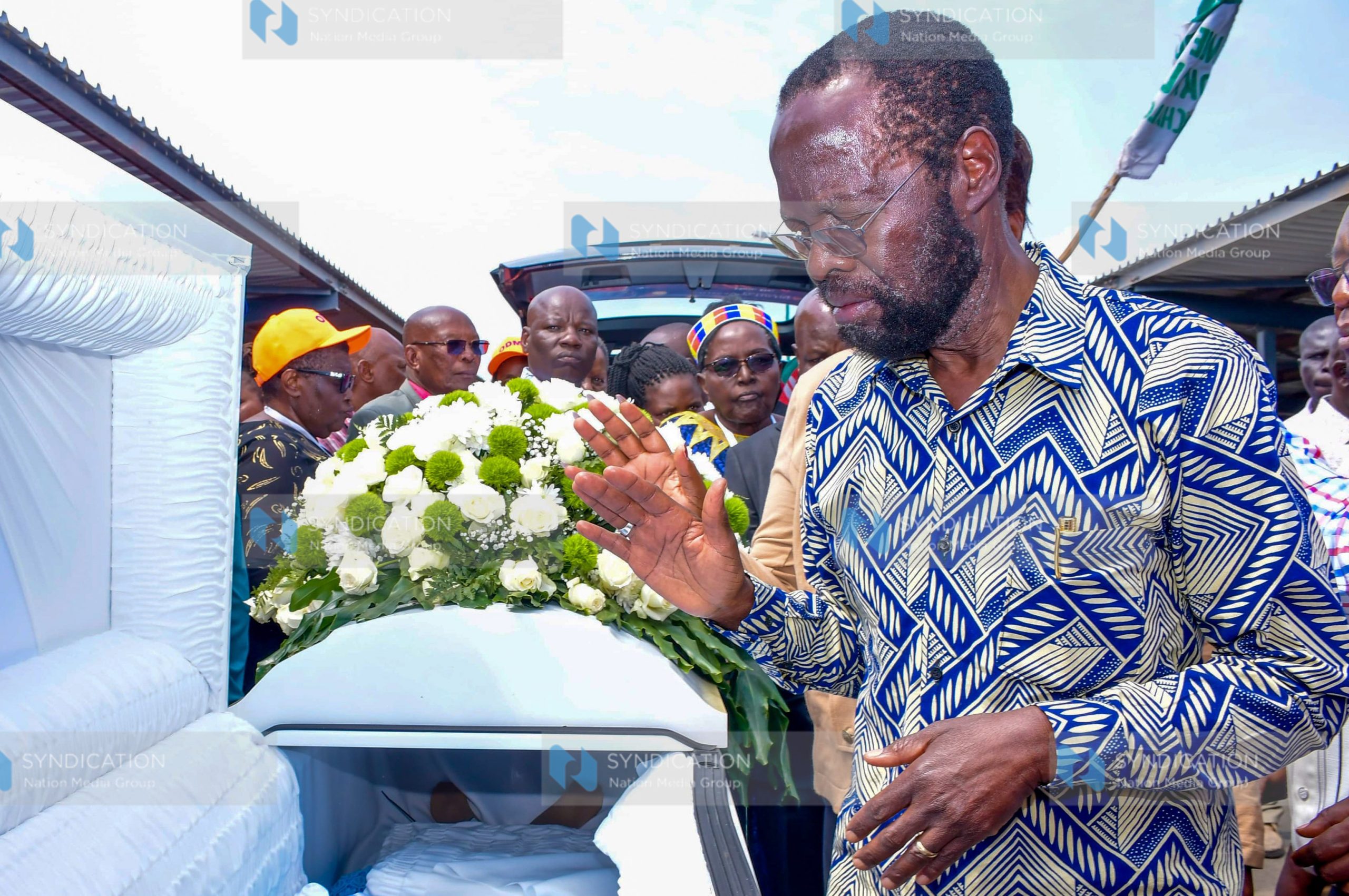 Anyang’ Nyong’o pays his respects beside the casket of the late Dr. Phoebe Asiyo