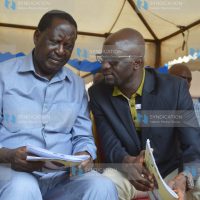 Raila Odinga (left) and Alego-Usonga MP Samule Atandi