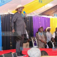 Raila Odinga speaking to mourners during the funeral service