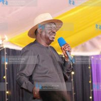 Raila Odinga speaks to mourners during the funeral service