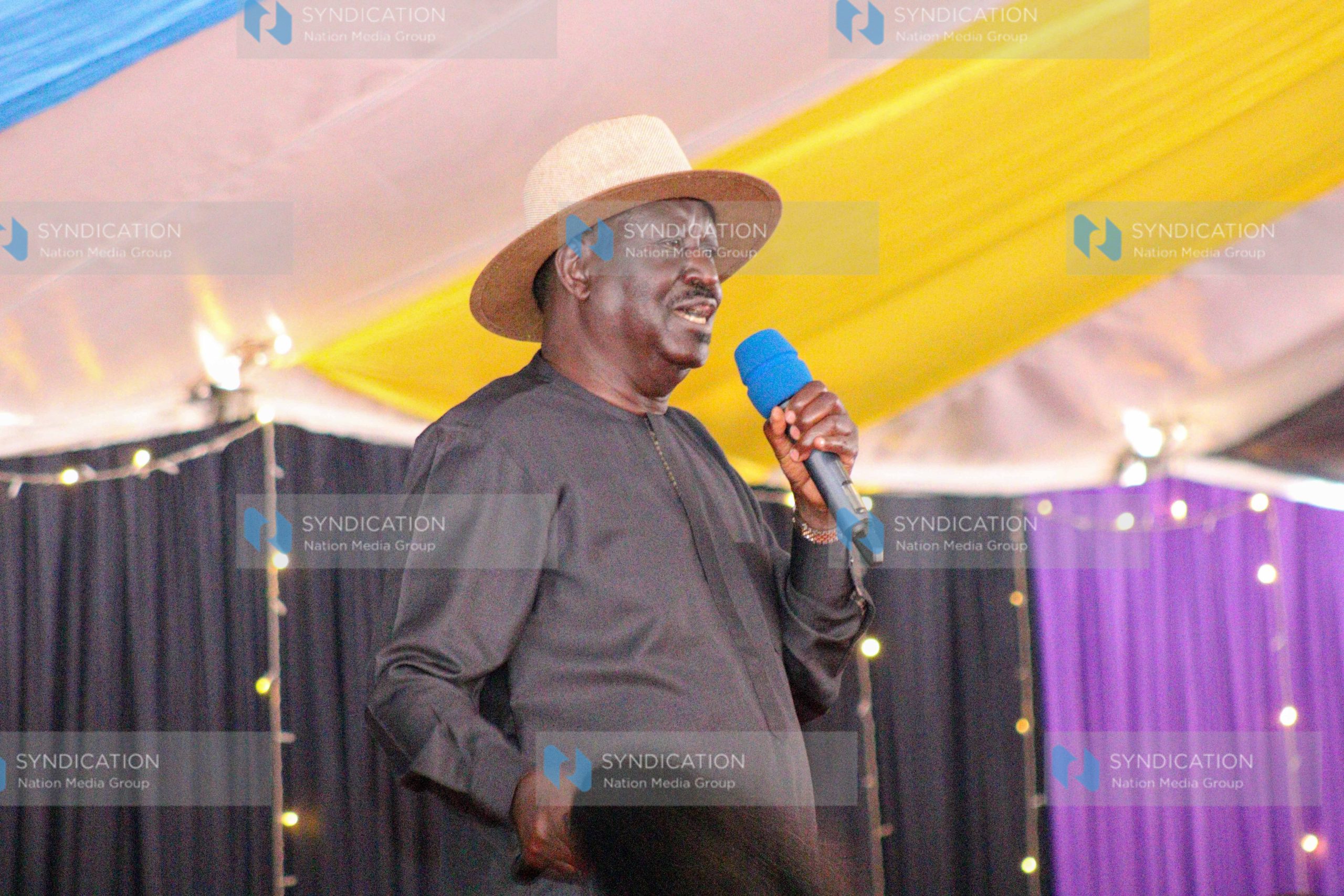 Raila Odinga speaks to mourners during the funeral service