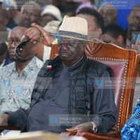 Opposition leader Raila Odinga attends the funeral service