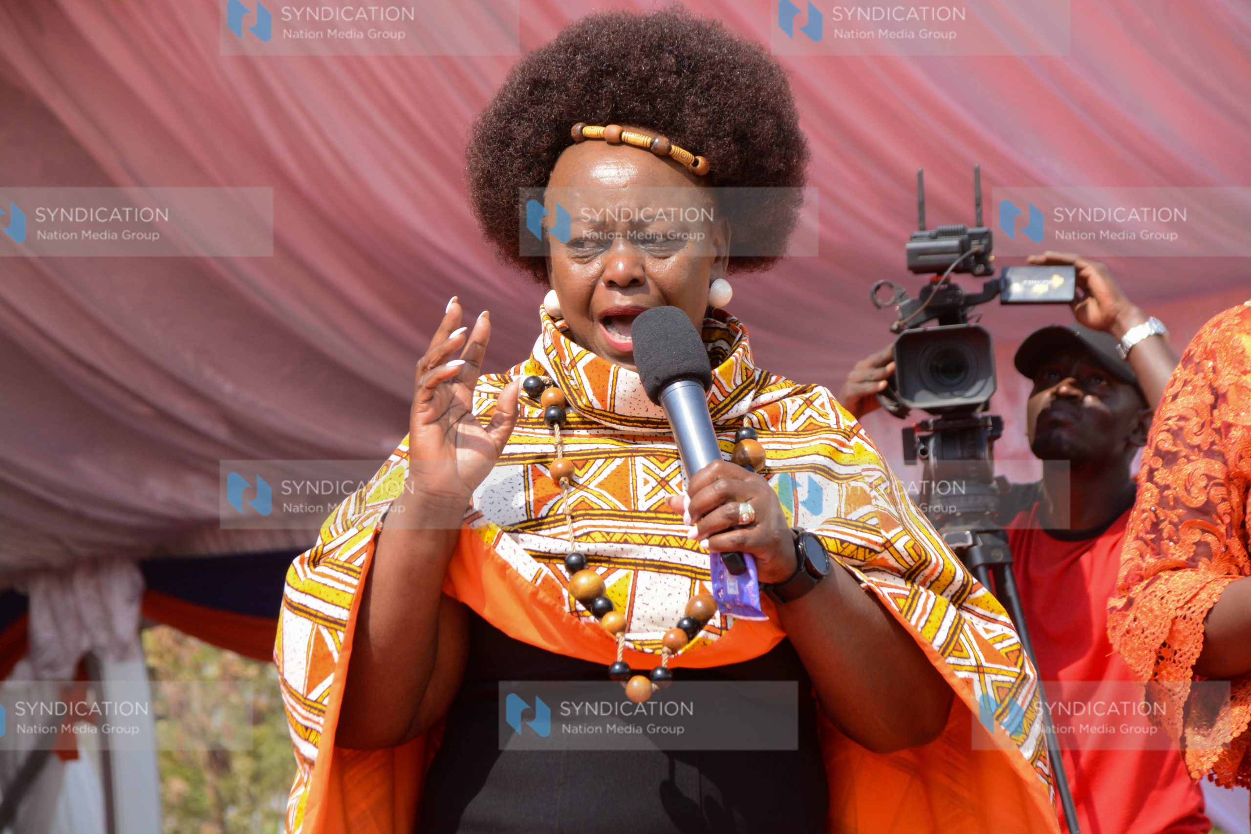 Millie Odhiambo, speaking at Bukiri Primary School