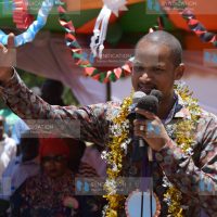 Babu Owino speaks to faithful at Raliew Catholic church