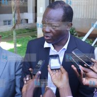 Cabinet Secretary without portfolio Raphael Tuju (right)