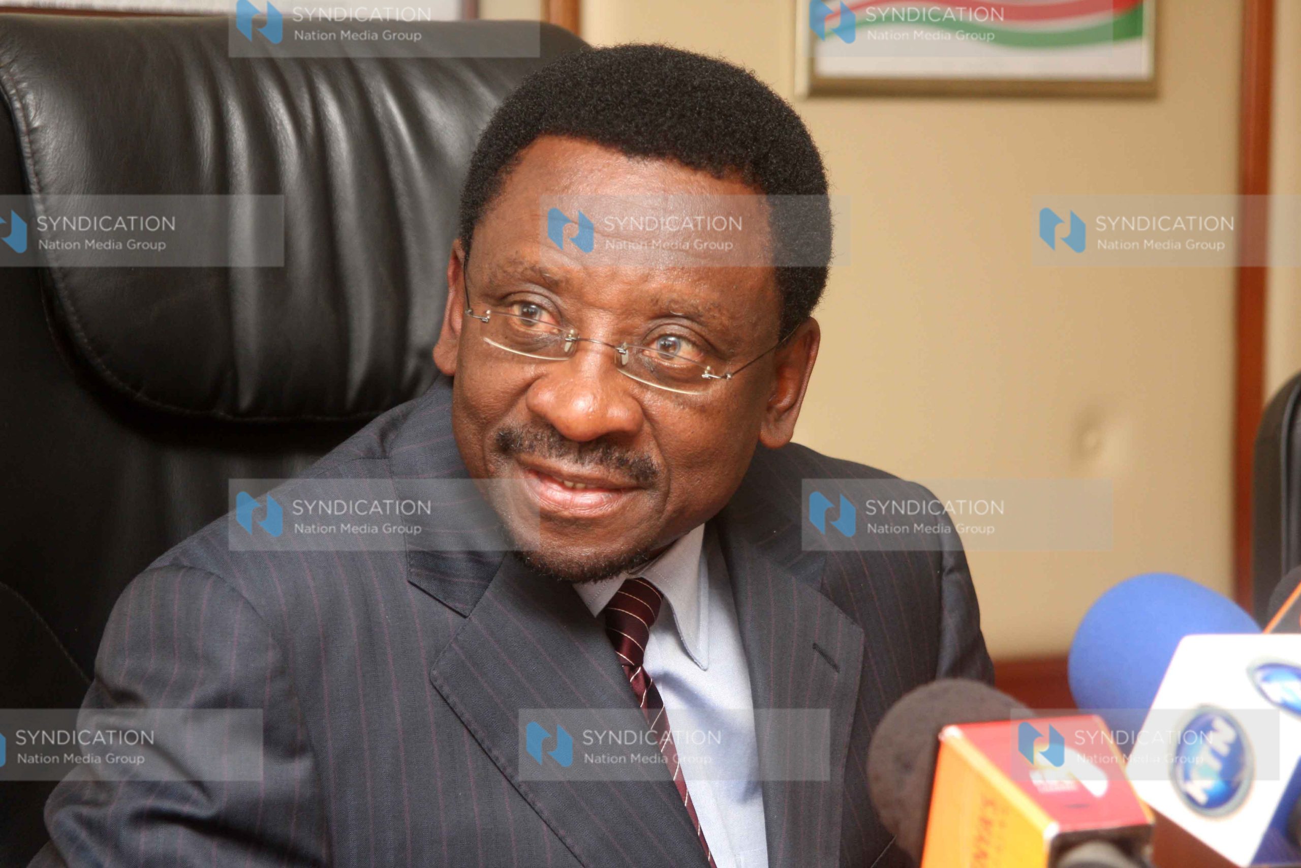 Lands Minister James Orengo addresses a press conference