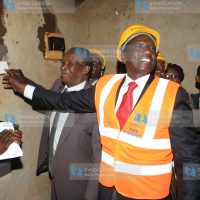 Deputy President William Ruto switches on the lights at Isoge Miracle Church