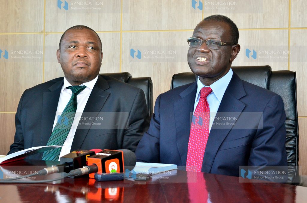 Meru County Senator Kiraitu Murungi (right) addressing media