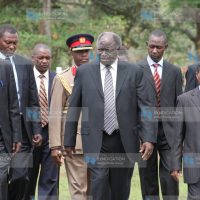 President Mwai Kibaki (centre)
