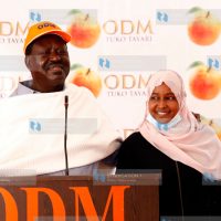 Raila Odinga (left) introduces Halima Daro ODM National Executive Council (NEC) Marsabit