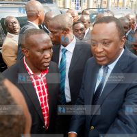 President Uhuru Kenyatta with Mathare Parliamentary aspirant George Wanjohi