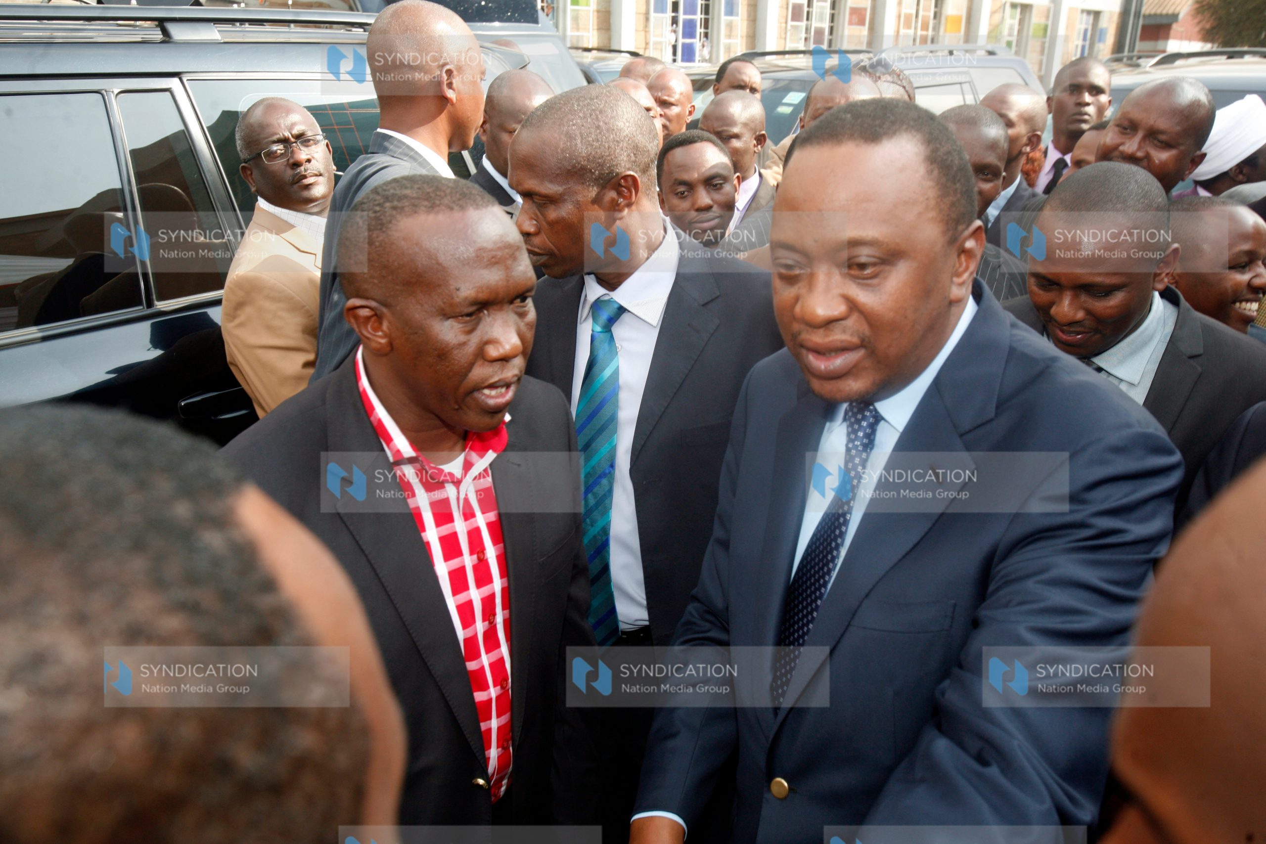 President Uhuru Kenyatta with Mathare Parliamentary aspirant George Wanjohi
