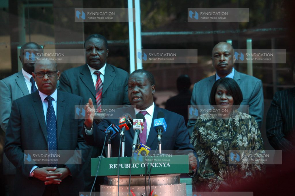 Government officials in addressing journalists at Harambee House