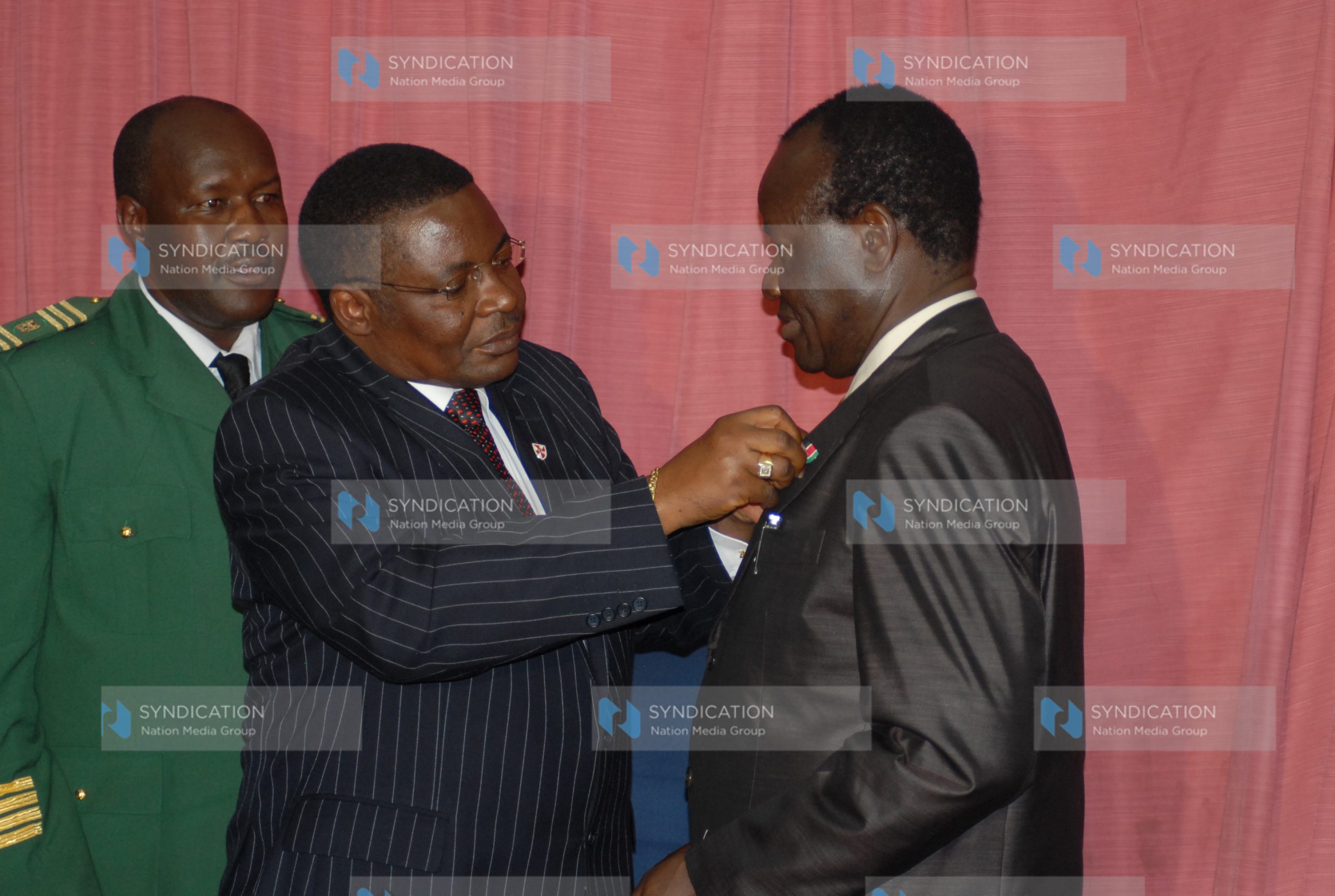 Charles Owino Omollo with the Head of State Commendation