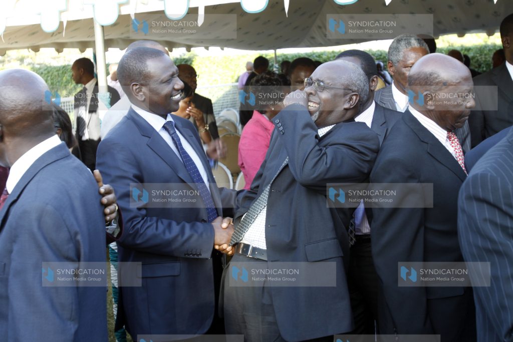 William Ruto with Franklin Bett at the home of the Minister for Environment the late John Michuki