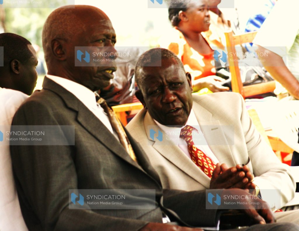 Former President Daniel arap Moi speaks to his former State House Comptroller, Mr. Abraham Kiptanui