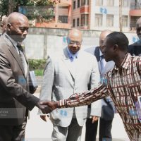 Former President Daniel arap Moi is met by Col. Fredrick Oyanda and other church elders