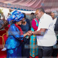 Uhuru Kenyatta condoles with Dr Barbara Odudu Magoha (left)