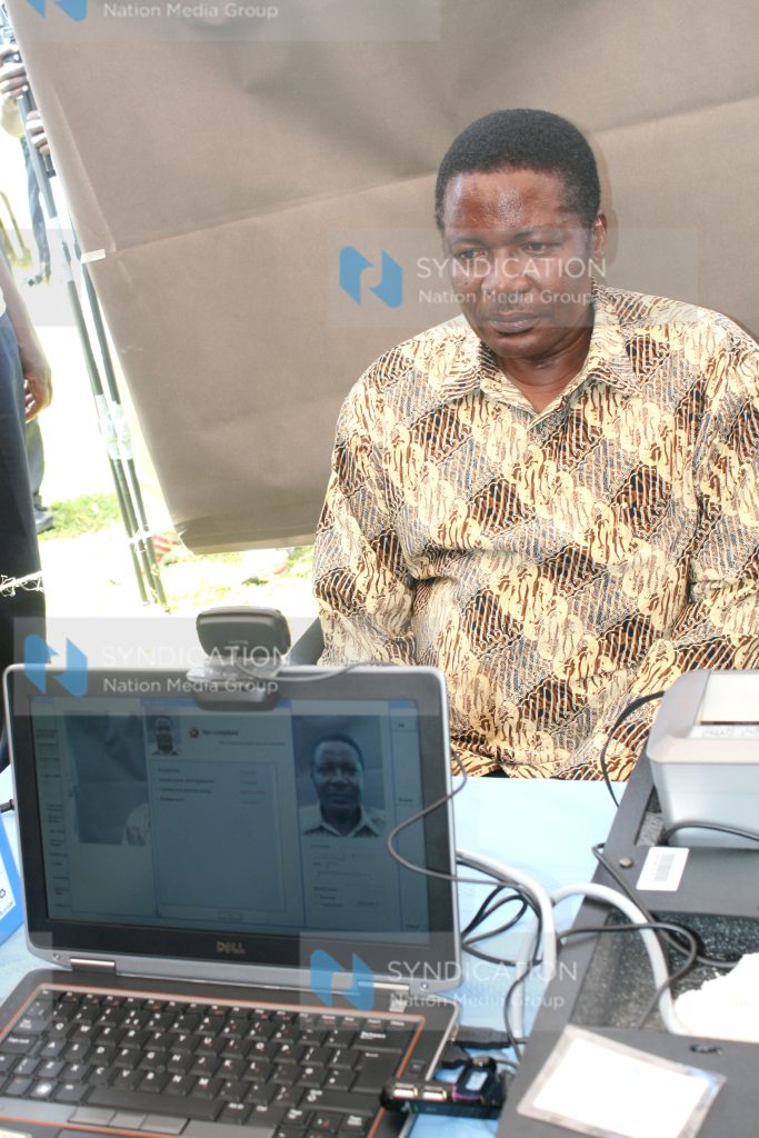 Kenneth Marende is photographed as he registers as a voter