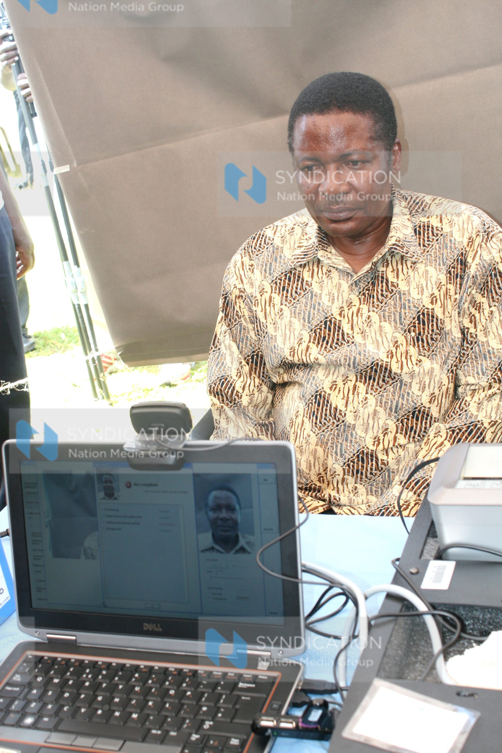 Kenneth Marende is photographed as he registers as a voter