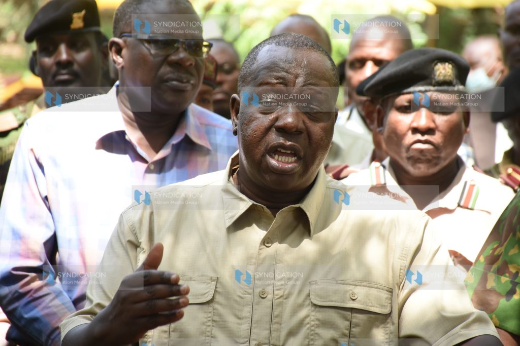 Interior CS Fred Matiang'i and security teams from Isiolo and Meru