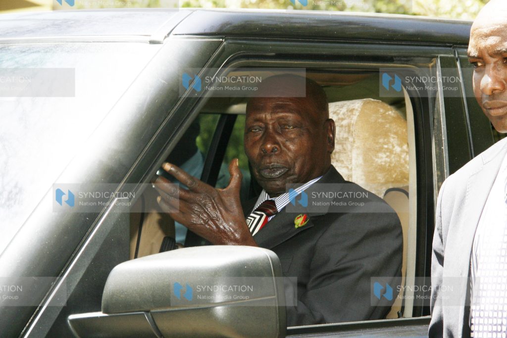 Former President Daniel Arap Moi (C) leaves the AIC Kabarak Community Chapel