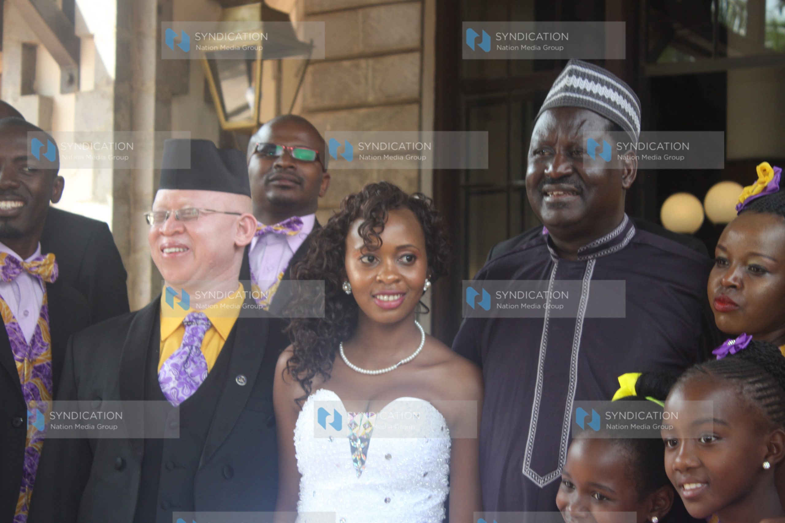 Former Prime Minister Raila Odinga with MP Isaac Mwaura and his wife Mukami Mwaura