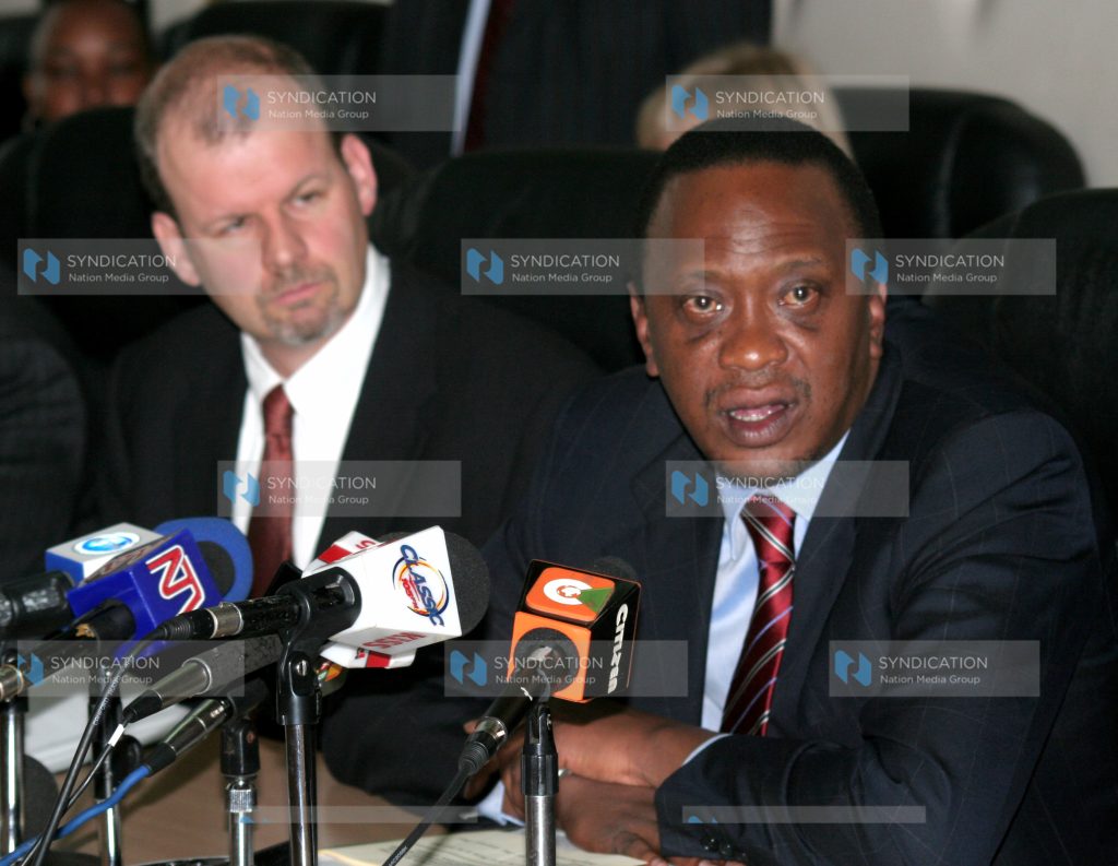 Minister of trade Uhuru Kenyatta speaks after signing agreements for US$413 million for transport, energy, social protection and Environment projects