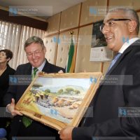 Minister for Tourism Najib Balala present a gift of art drawing showing migration of world beasts to his counterpart from South Africa, Marthinus van Schalkwyk
