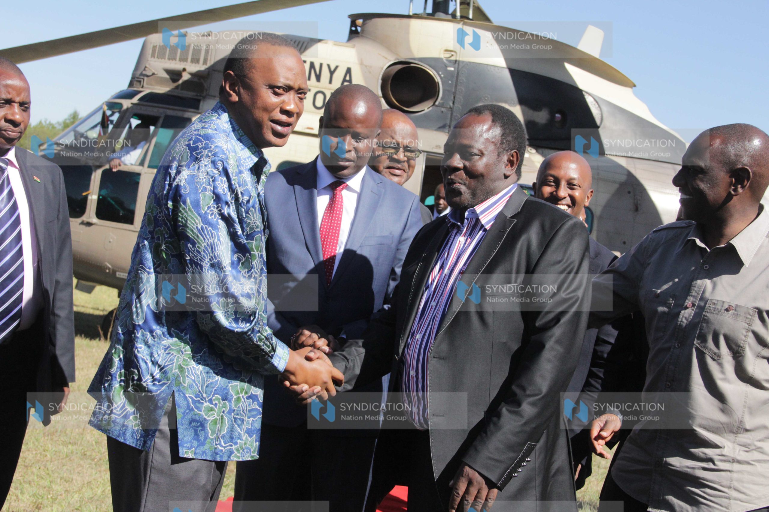 President Uhuru Kenyatta greets Nyeri governor Nderitu Gachagua