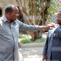 Majority Leader Aden Duale shares a word with Suna East MP Junet Mohamed