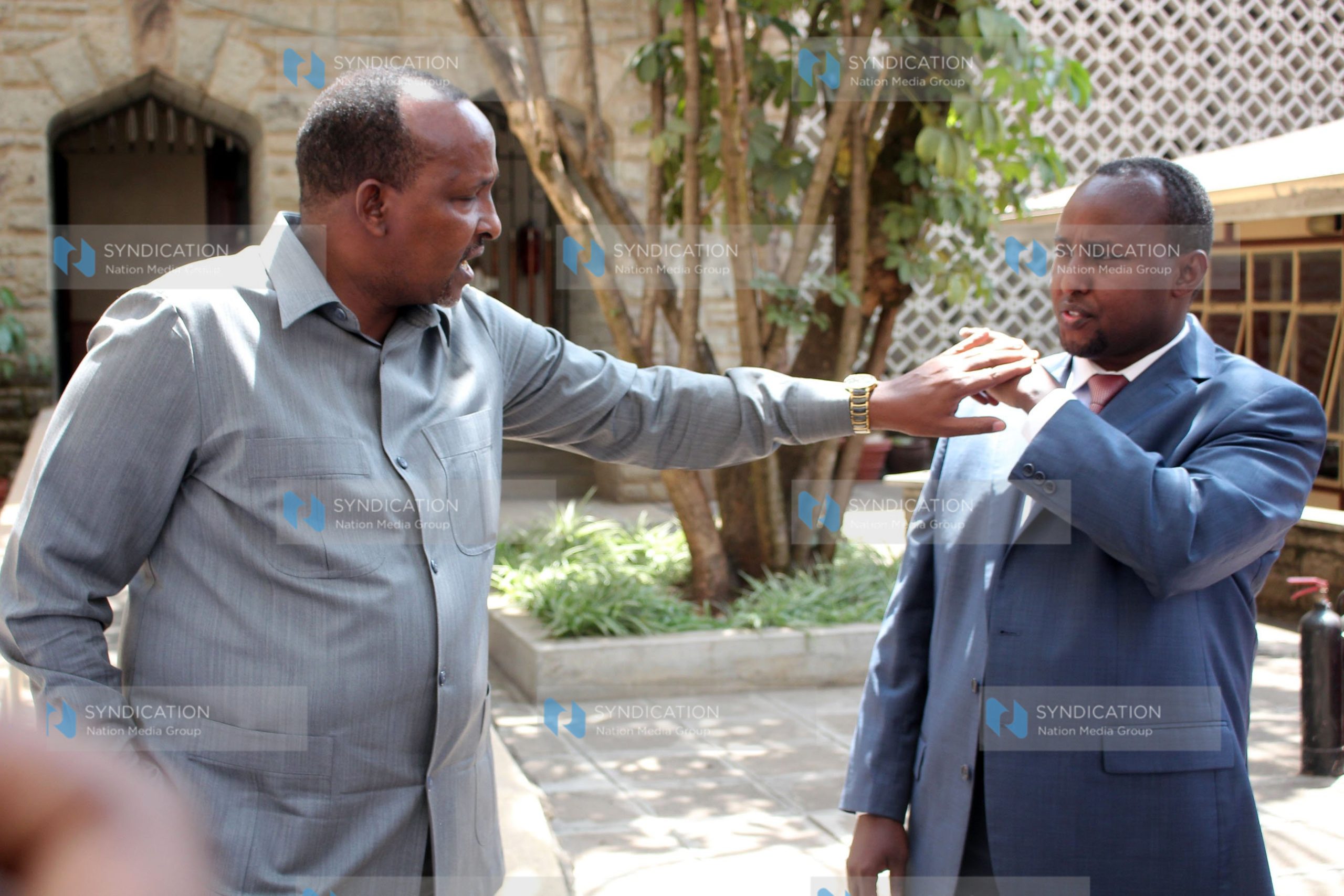 Majority Leader Aden Duale shares a word with Suna East MP Junet Mohamed