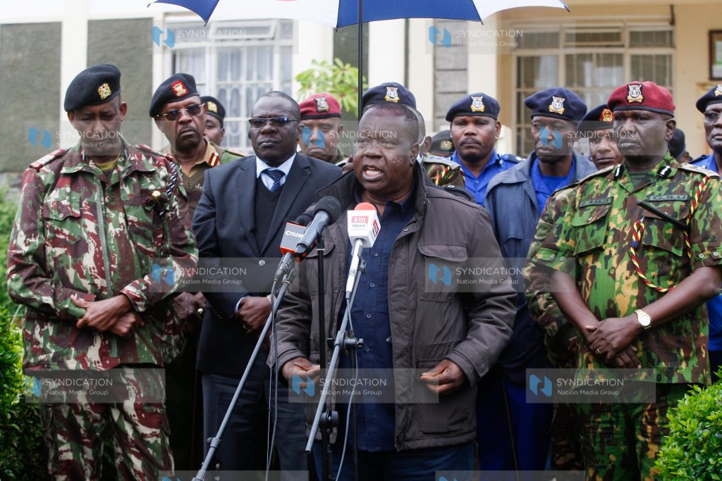Interior CS Fred Matiang’i flanked by other senior officers
