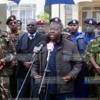 Interior CS Fred Matiang’i flanked by other senior officers
