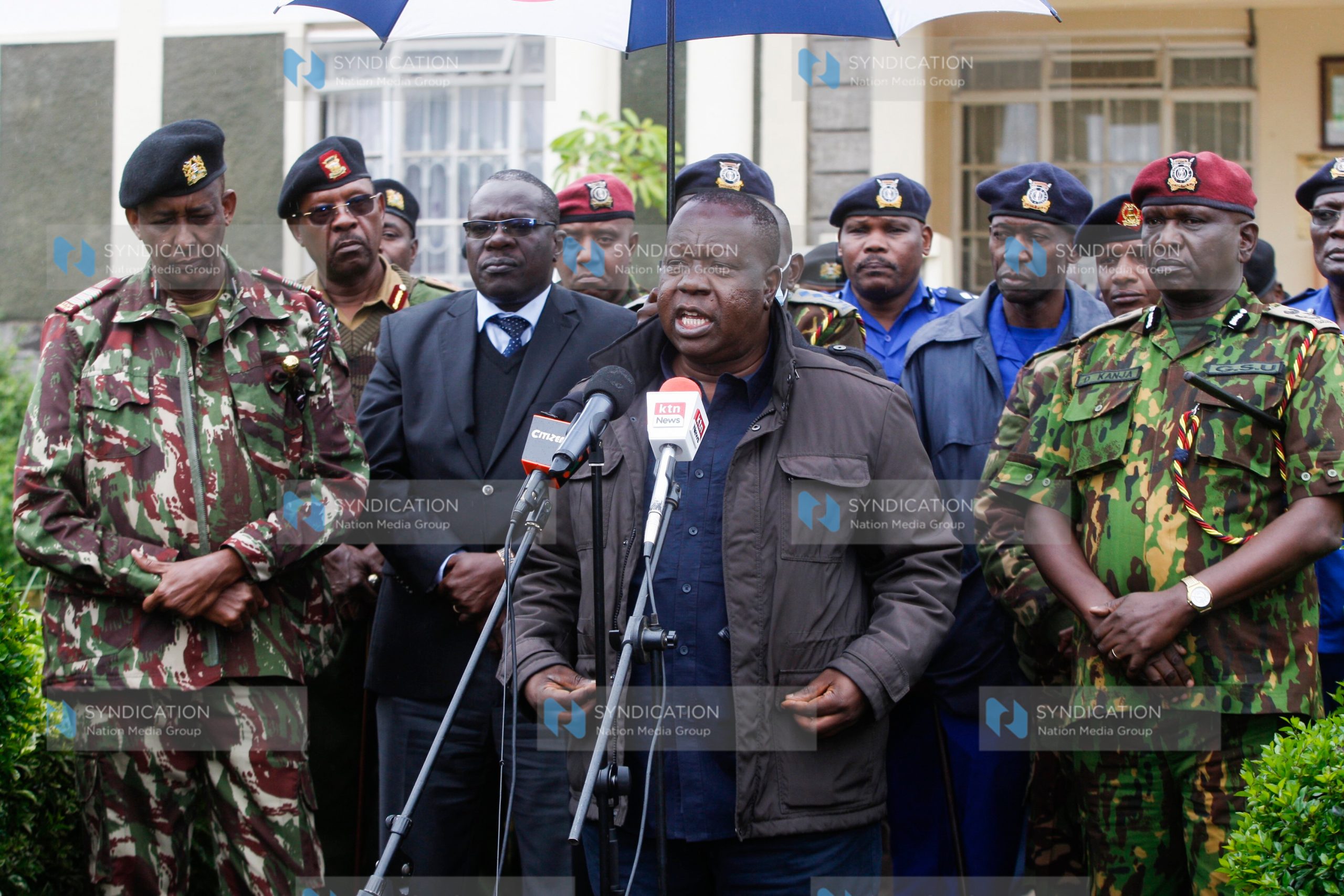 Interior CS Fred Matiang’i flanked by other senior officers