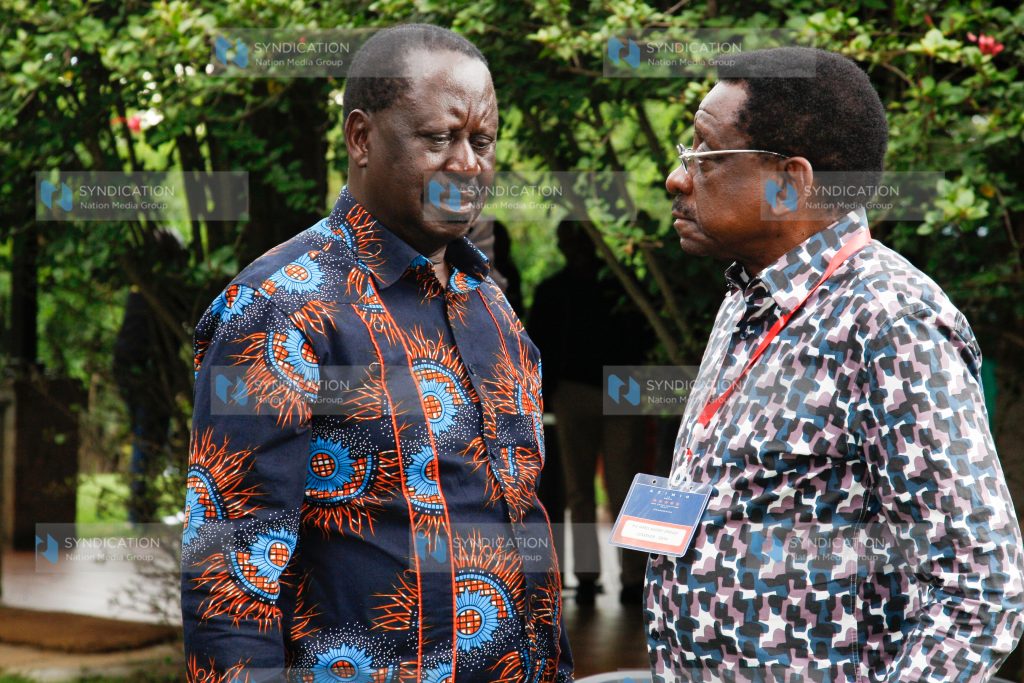 Azimio la Umoja One Kenya Alliance party leader Raila Odinga confers with Siaya Governor James Orengo