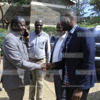 ODM leader Raila Odinga is welcomed by the party's Secretary General Edwin Sifuna and the Chairman, John Mbadi