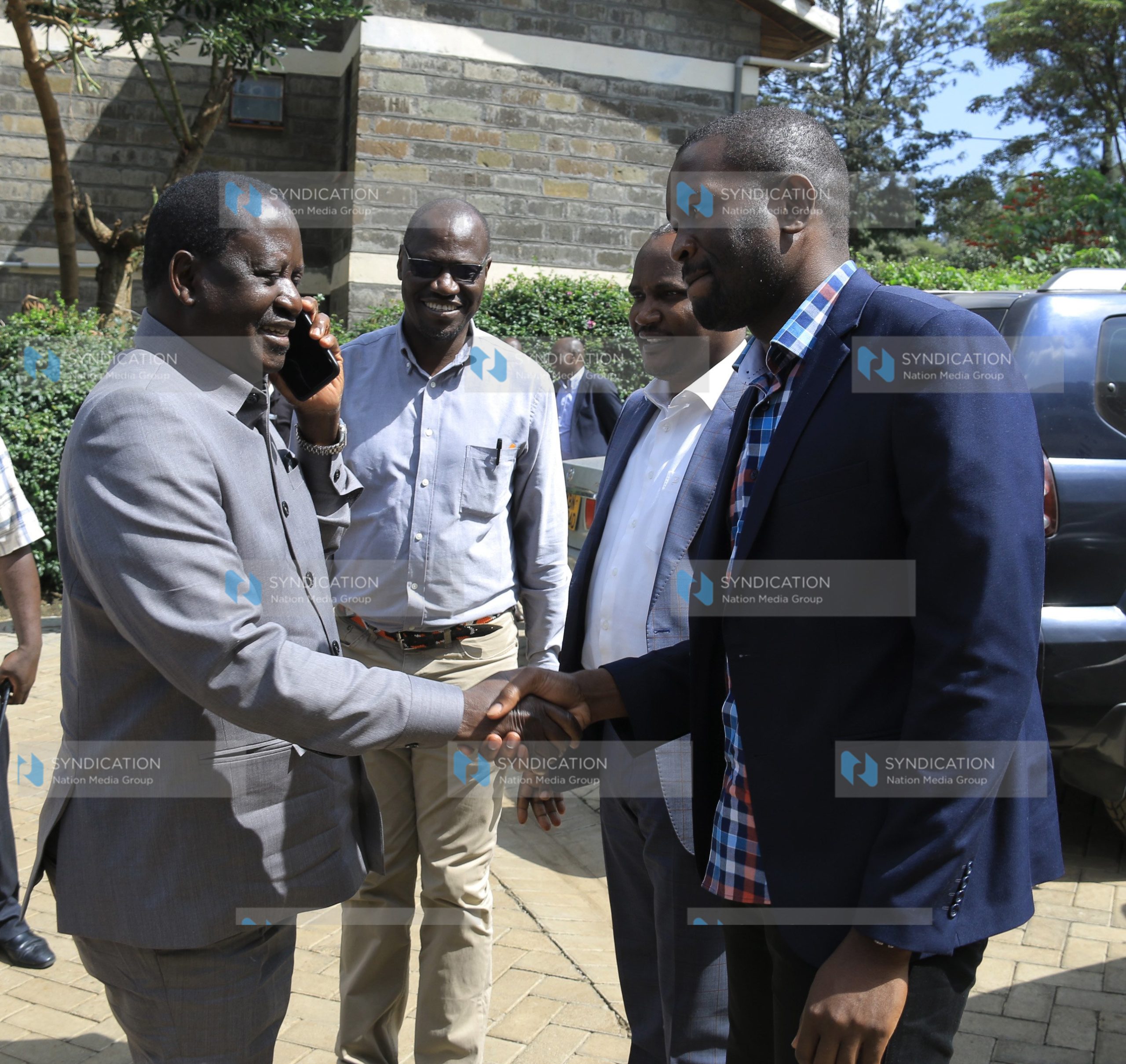 ODM leader Raila Odinga is welcomed by the party’s Secretary General Edwin Sifuna and the Chairman, John Mbadi