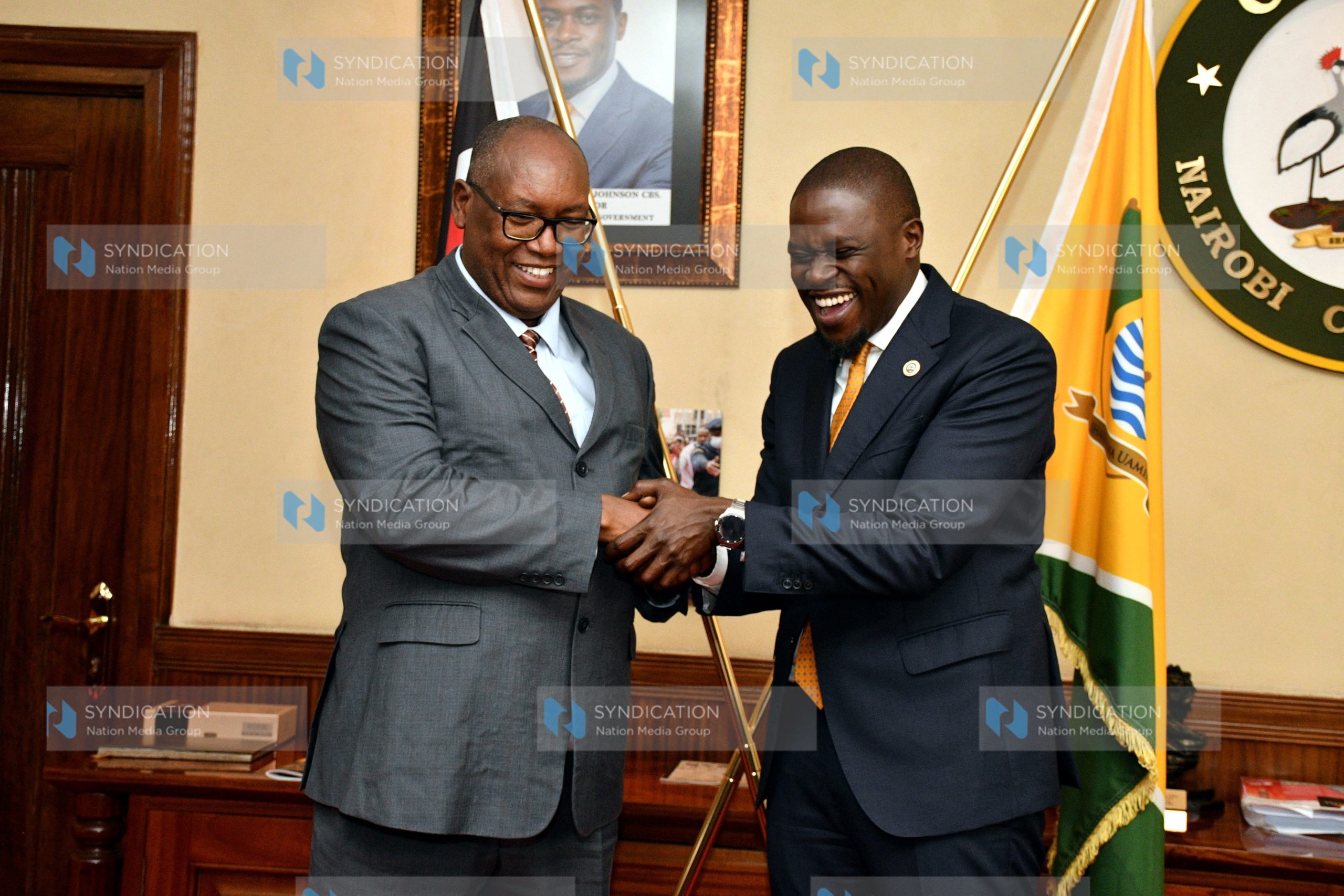 Nation Media Group (NMG) Group Chief Executive Officer Stephen Gitagama and Nairobi County Governor Johnson Sakaja