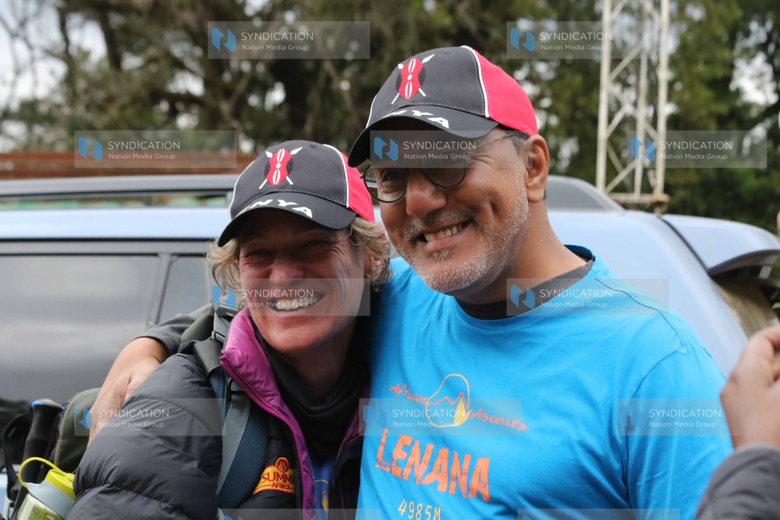 Tourism CS Najib Balala hugs Sally Grierson