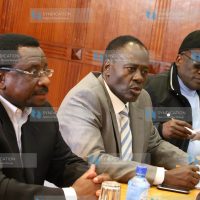 Nyeri governor Nderitu Gachagua, second left, addresses journalists