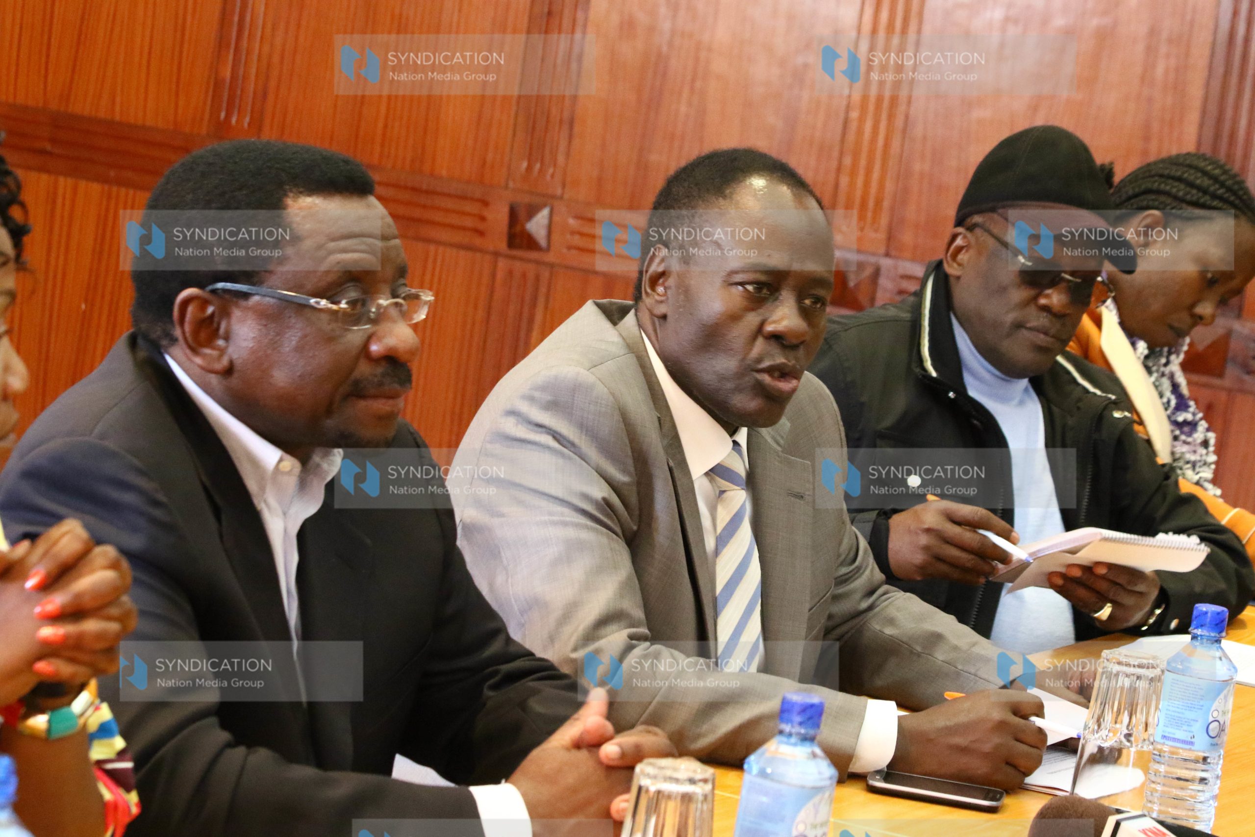 Nyeri governor Nderitu Gachagua, second left, addresses journalists