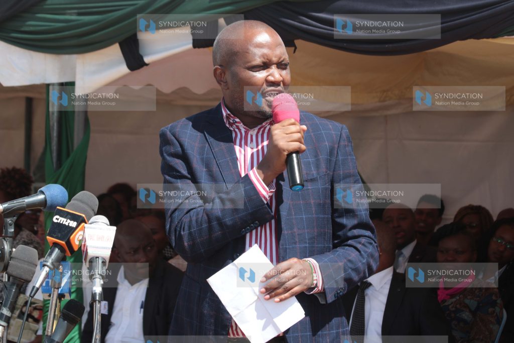 Gatundu South MP Moses Kuria addressing mourners
