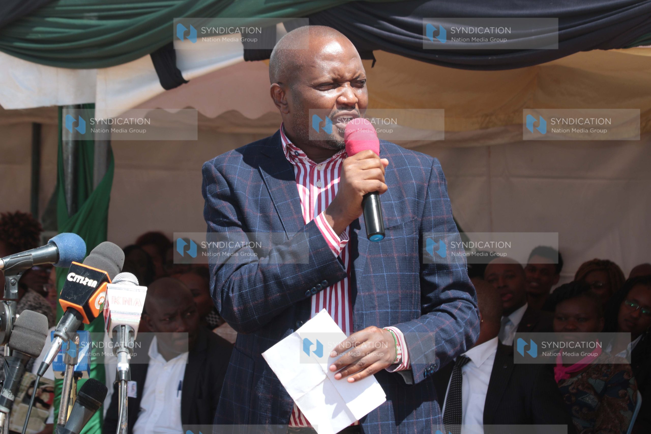 Gatundu South MP Moses Kuria addressing mourners
