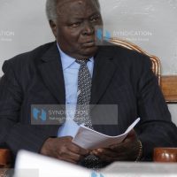 Former President Mwai Kibaki follows proceedings at Nyeri High Court