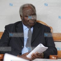Former President Mwai Kibaki follows proceedings at Nyeri High Court