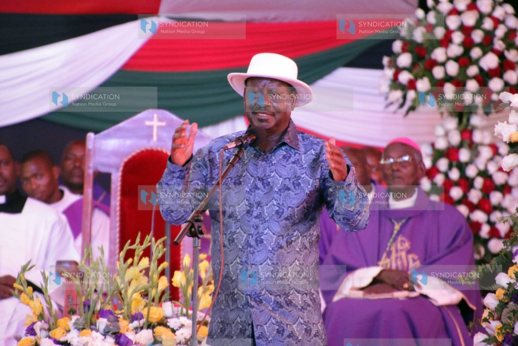 Former Prime Minister Raila Odinga addresses mourners
