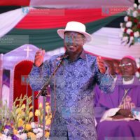 Former Prime Minister Raila Odinga addresses mourners