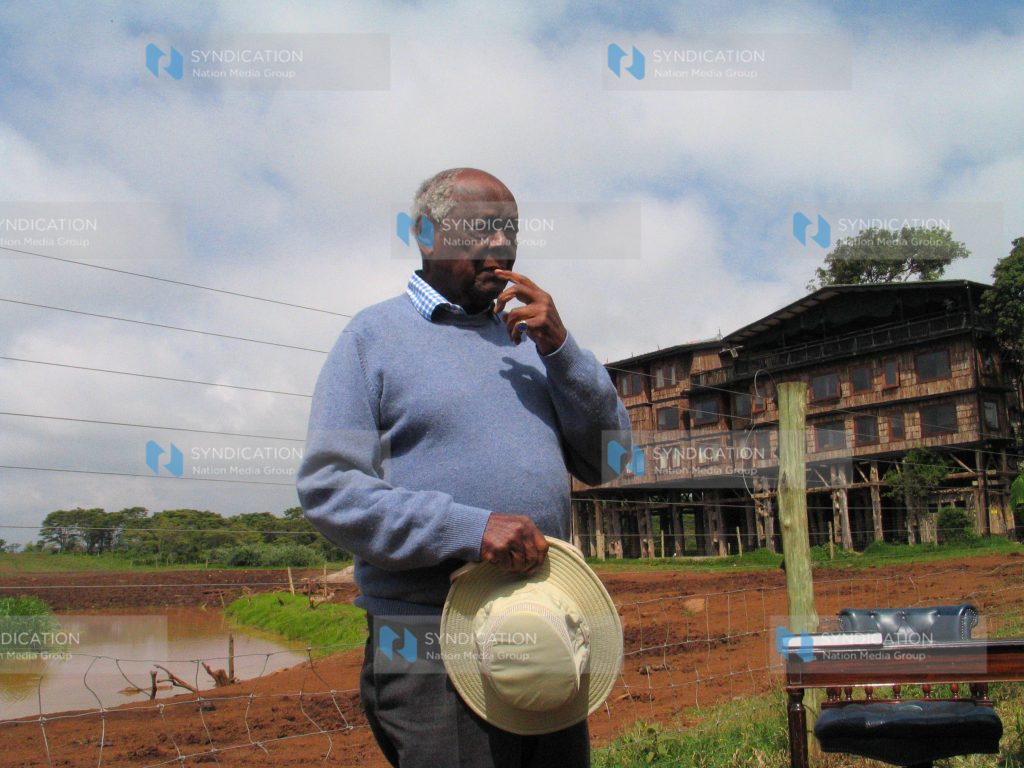 Former Attorney General Charles Njonjo in a pensive mood outside Treetops Hotel